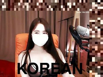 Korean busty camgirl in tan pantyhose masturbates