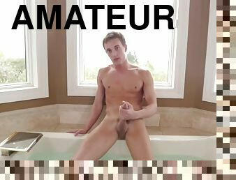 Muscular jock jerking off in jacuzzi