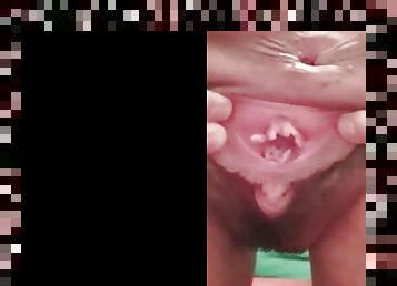 cute young woman shows her vagina and anus wide open