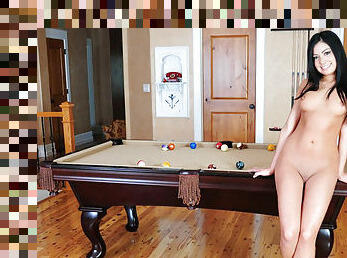 Teen model strips on a pool table