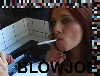 Redhead smokes and sucks cock in bathtub