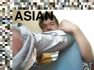 Asian boy undresing