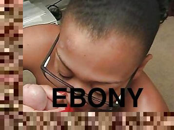 Ebony slut sucks cock in the office