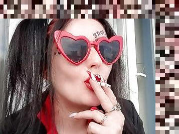 Sexy smoking fetish from Dominatrix Nika. Mistress smokes 2 cigarettes