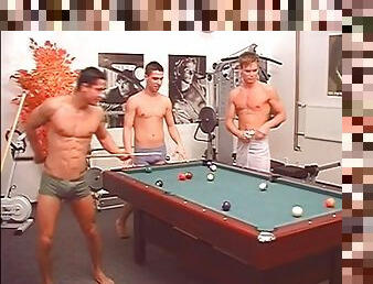 Topless guys play pool and strip naked