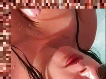German milf with huge tits gives a blowjob handjob and tit fuck in a hot tub
