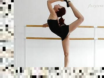 Redheaded ballerina in a little black dress