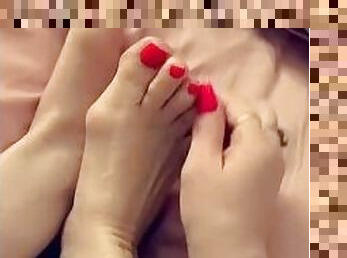 Lotioning freshly pedicured toes