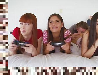 Pretty gals playing video games and that leads to orgy