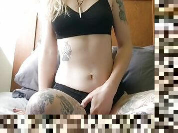 Cute tattooed blonde rubs pussy through panties