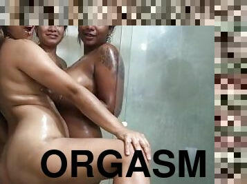trio of Venezuelans enjoy the shower