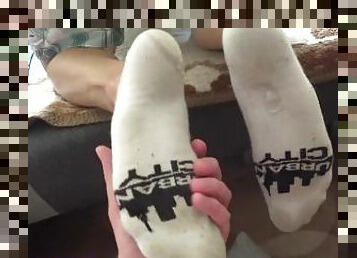 His warm, sweaty socks against my cock made me cum