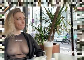 Flashing tits in cafe with glass walls so all people outside see me. Transparent t-shirt no bra.