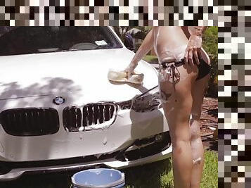 Washing a car outdoors can be fun if you're naked