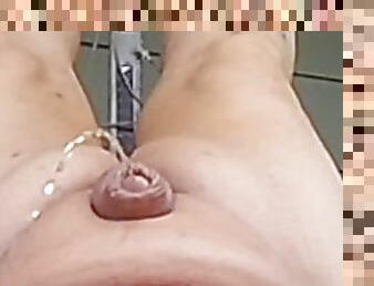 naked Fat man pissing upside down