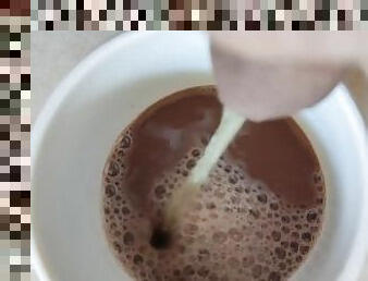 Piss into a cup of chocolate milk