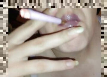 Smoking purple cigarette