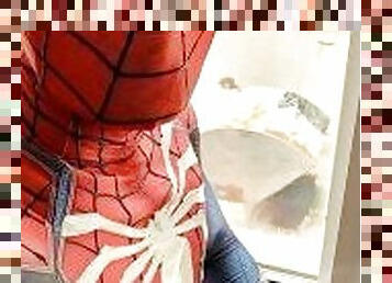 exhibitionist spiderman cums from hotel window ????