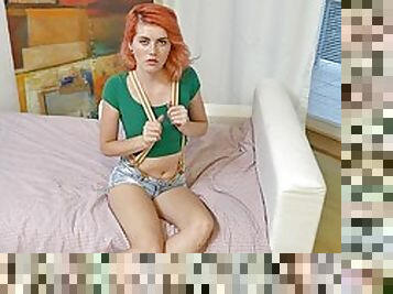 Slim redhead teen fiddles with her cunt while alone