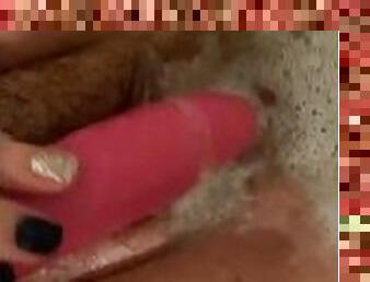 Pink dildo in the bathtub ????