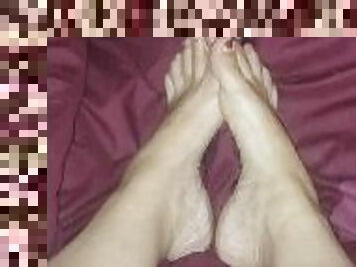 Sexy feet dancing in bed