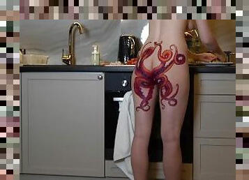 Naked housewife with octopus tattoo on ass cooks dinner