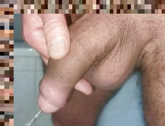 Semi hard uncut cock piss