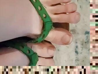 Tops of Feet in Flip-Flops