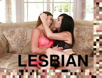 Passionate lesbians use the couch for naughty oral experience