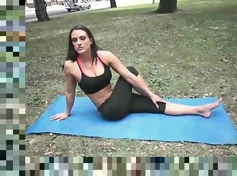 Misty Anderson does yoga in a public park