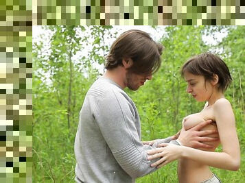 Young babe shares spectacular XXX moments into the woods